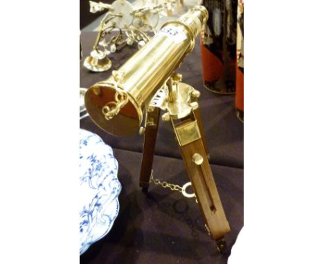 BRASS TELESCOPE. Brass telescope on wooden tripod stand, H: 30 cm