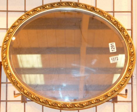 OVAL MIRROR. Oval gilt wood framed mirror, H: 56 cm