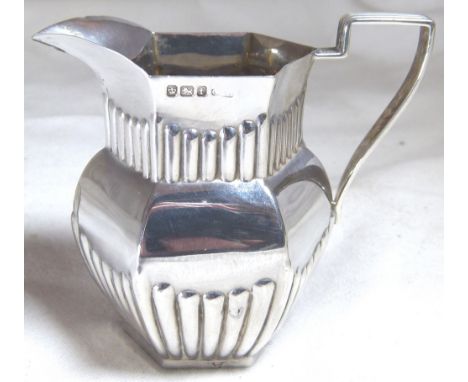 SILVER CREAM JUG. Hallmarked silver cream jug, Assay Sheffield 1898  CONDITION REPORT: Weight: 53 g
Dimensions: H: 70 mm W: 7