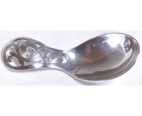 SILVER CADDY SPOON. Hallmarked silver caddy spoon with pierced handle decoration, assay Sheffield 1964 Maker O & E Ltd 