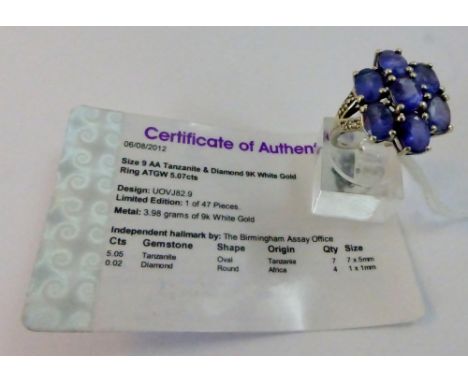 9 ct white gold tanzanite and diamond ring with certificate size O