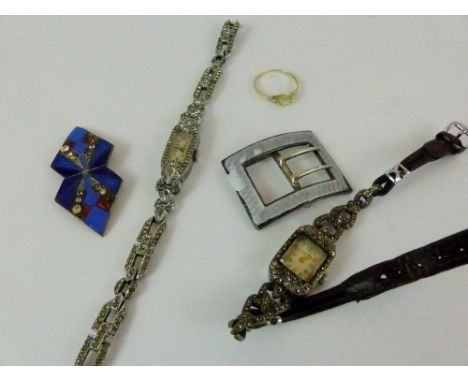 Marcasite ladies wristwatches, two ladies enamelled buckles, one hallmarked silver, 9ct gold and periodot ring.