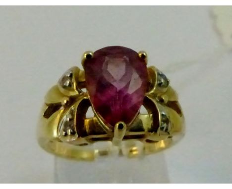 9ct yellow gold red andesine and diamond set ring. 4-58g. Size N.