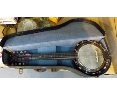 Vintage British made eight string banjo. 