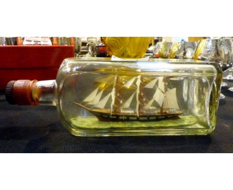 Small vintage ship in a bottle