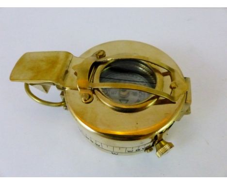 Brass compass stamped T.E. Co Ltd London 1940 crows foot to base