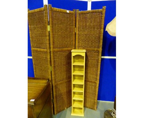 Bi-fold wicker screen and a modern CD rack