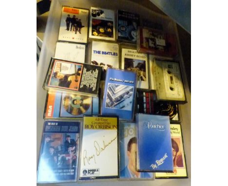 Tray of retro music cassettes including Beatles and Elvis