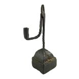 AN 18TH CENTURY WROUGHT IRON RUSH LIGHT HOLDER the iron work in two sections joined by a single