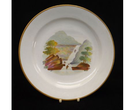 A SWANSEA PORCELAIN PLATE DECORATED BY WILLIAM WESTON YOUNG with centred Glynneath waterfall within a solid gilt rim, inscrib