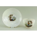 A SWANSEA GLASSY PORCELAIN CUP & SAUCER BY WILLIAM BILLINGSLEY the saucer painted with a scene of