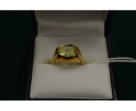A gold and citrine ring, size N.
