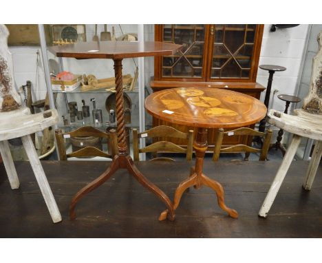 Two inlaid mahogany tripod tables.