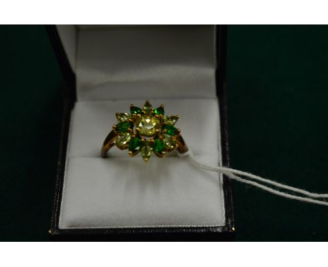 A gold cluster ring, size U.