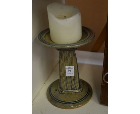 Pottery candlestick.
