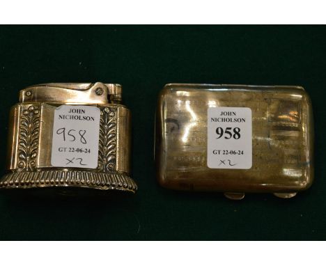 A silver cigarette case and a Ronson Diana table lighter.