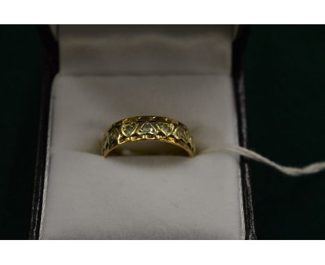 A 9ct gold and cubic zirconia ring.
