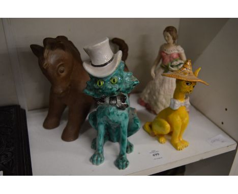 An amusing turquoise glazed pottery model of a cat wearing a top hat by Mosanic together with a similar cat in a sombrero and