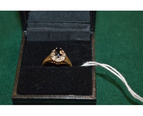 A gold, sapphire and diamond ring, size K.