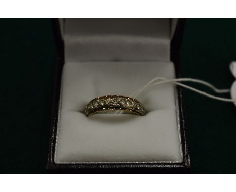 A 9ct gold and cubic zirconia ring.