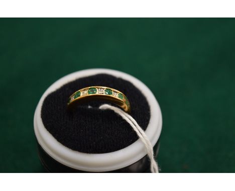 A 9ct gold, emerald and diamond ring, size O.