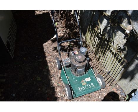 A Hayterette petrol rotary lawn mower.
