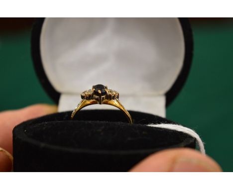 A 9ct gold, sapphire and diamond ring, size N.