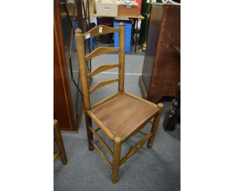 Six 19th century ash ladder back dining chairs.