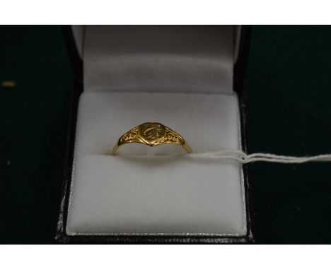 A 9ct gold signet ring, size R.