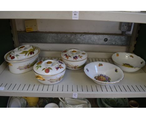 Three Royal Worcester Evesham covered dishes together with a pair of fruit decorated bowls.