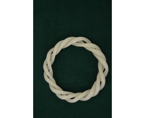 A jade twist bangle.