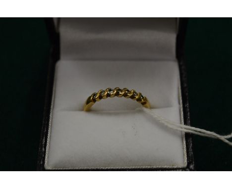 A gold and diamond ring, size O.