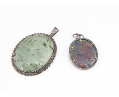 A synthetic opal silver set pendant, 4cm x 2.5cm together with a green hardstone silver set pendant, 5.4cm x 3.5cm, 26g