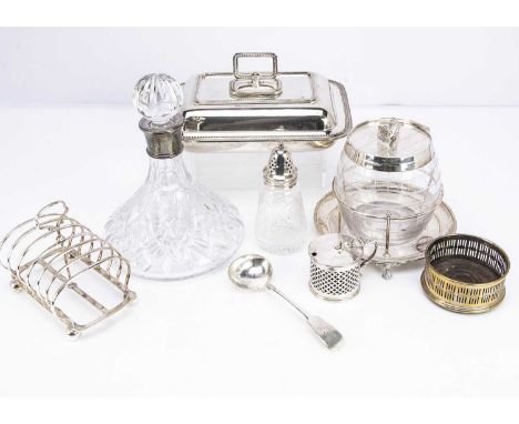 A modern glass ship's decanter and stopper with silver collar from Mappin &amp; Webb and a small collection of silver plated 