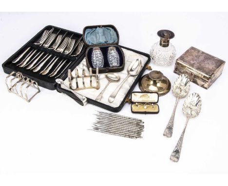 A collection of silver and silver plate and other items, including a pair of silver toast racks, a pair of berry spoons, a de