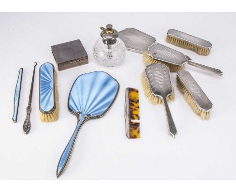 A part Art Deco silver dressing table set and other items, including a damaged silver and blue enamel hand mirror, damaged, c