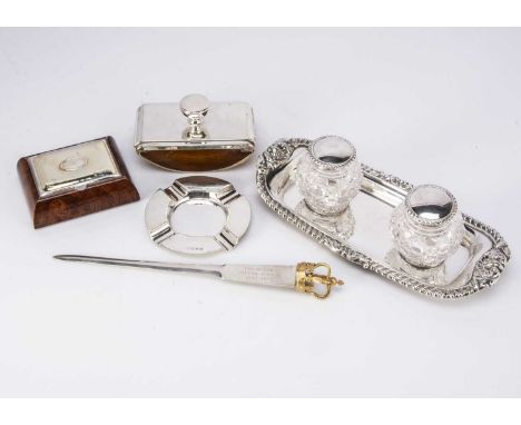 Five collectable silver desk items, including a George III silver inkwell stand with a pair of cut glass inkwells, one with d