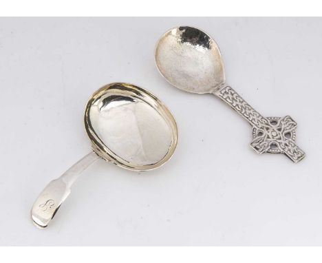 Two silver tea caddy spoons, one a Georgian fiddle pattern example by JS, the other with Celtic cross handle (2)