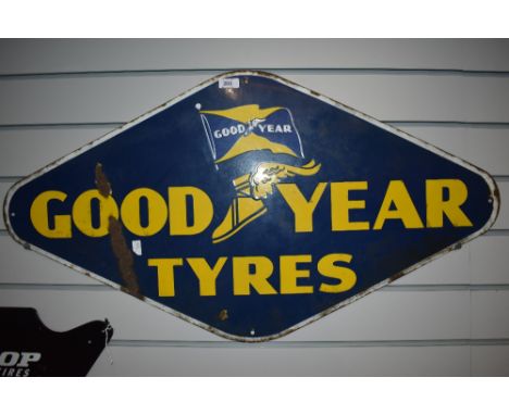 A vintage enamel Good Year Tyres advertising sign.