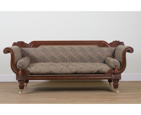 A GEORGE IV CARVED MAHOGANY FRAMED SCROLL END SOFAOn tapering reeded supports, 205cm wide; 84cm highOld marks and scratches p