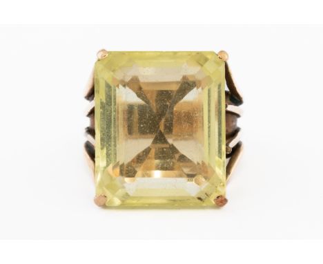 A GOLD AND PRASIOLITE COCKTAIL RINGClaw set with an emerald cut prasiolite measuring 18.6mm x 15.6mm, the mount detailed 14ct