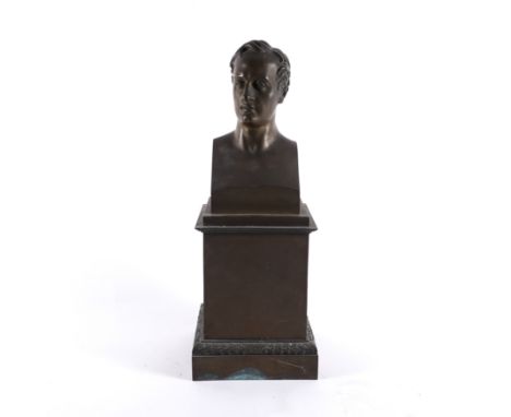 A FRENCH PATINATED BRONZE PORTRAIT BUST OF A GENTLEMAN PROBABLY THE POET LORD BYRON19th Century 
Modelled with head turned sl
