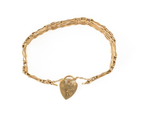 A 9CT GOLD GATE LINK BRACELETIn a bar, ridged bar and oval link design, on a 9ct gold heart shaped padlock clasp, weight 15.1