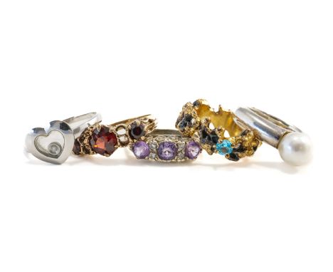 TWO GOLD RINGS AND THREE FURTHER RINGS (5)Comprising; a 9ct white gold ring, with a heart shaped motif enclosing a circular c