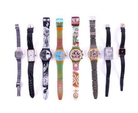 A GROUP OF WRISTWATCHES AND STANDS (13)The eight wristwatches including; four Swatch watches and a lady's Seiko Quartz bracel