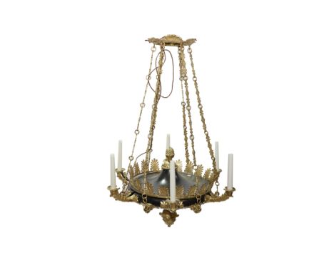 A REGENCY STYLE GILT AND PATINATED METAL SIX LIGHT CHANDELIERLate 20th Century 
With acanthus leaf clasped candle arms issuin