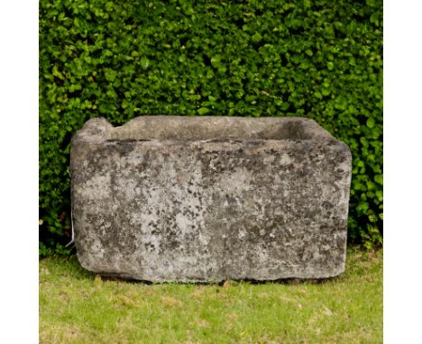 A RECTANGULAR CARVED COTSWOLD STONE TROUGH80cm wide; 40cm high; 61cm deep