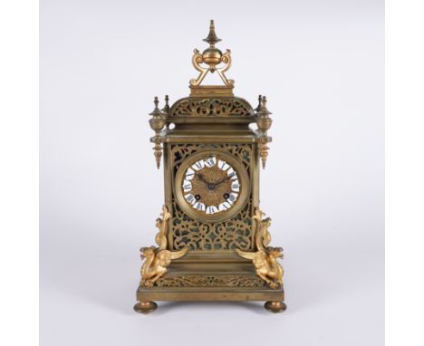 A 19TH CENTURY BRONZE CHIMING 8 DAY MANTLE CLOCKwith pierced fretwork case 19cm wide; 38cm high