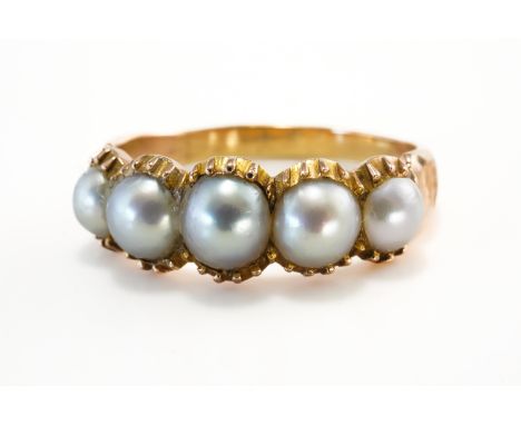 A GOLD AND HALF PEARL RINGMounted with a row of five graduated half pearls, unmarked, ring size K, gross weight 2.8 grams