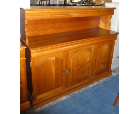 A Modern Dining Room Buffet Sideboard with Panelled Doors to Three Cupboard Base and Raised Display Shelf Incorporating Five 